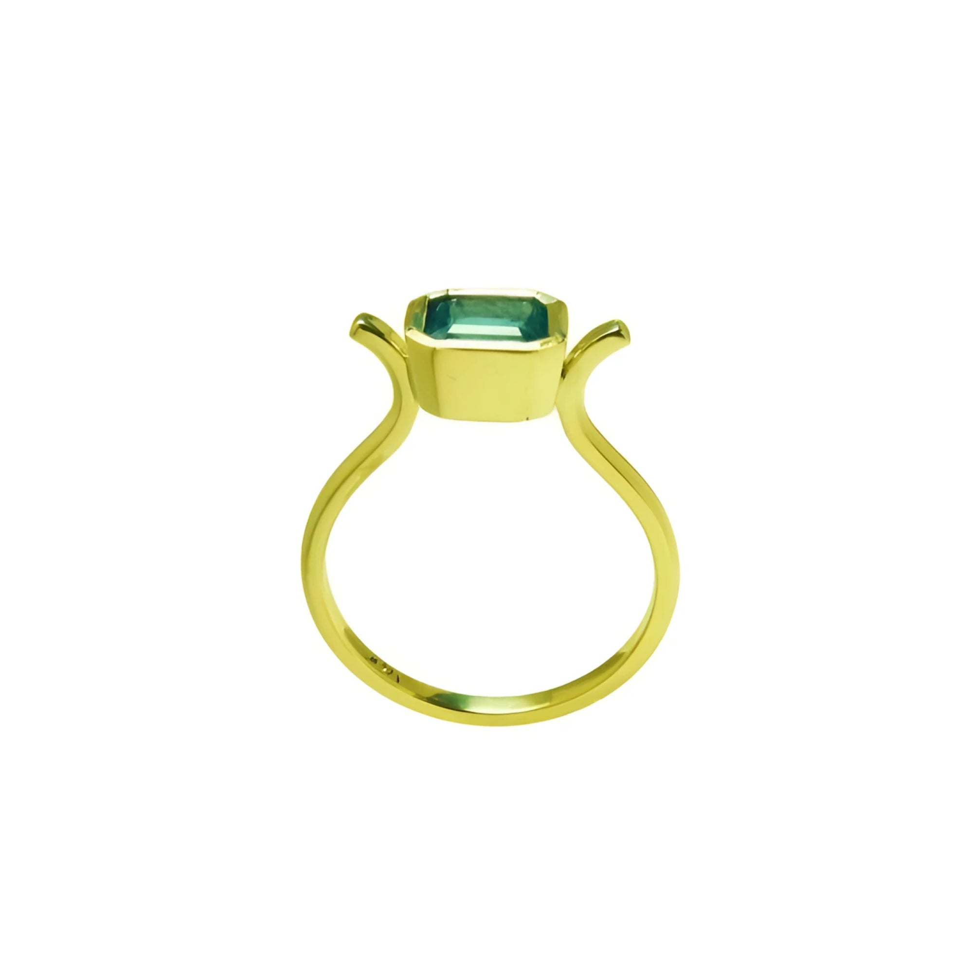 0.81 ct. emerald solitaire ring, bezel set in 14K yellow gold with a unique open shank design.