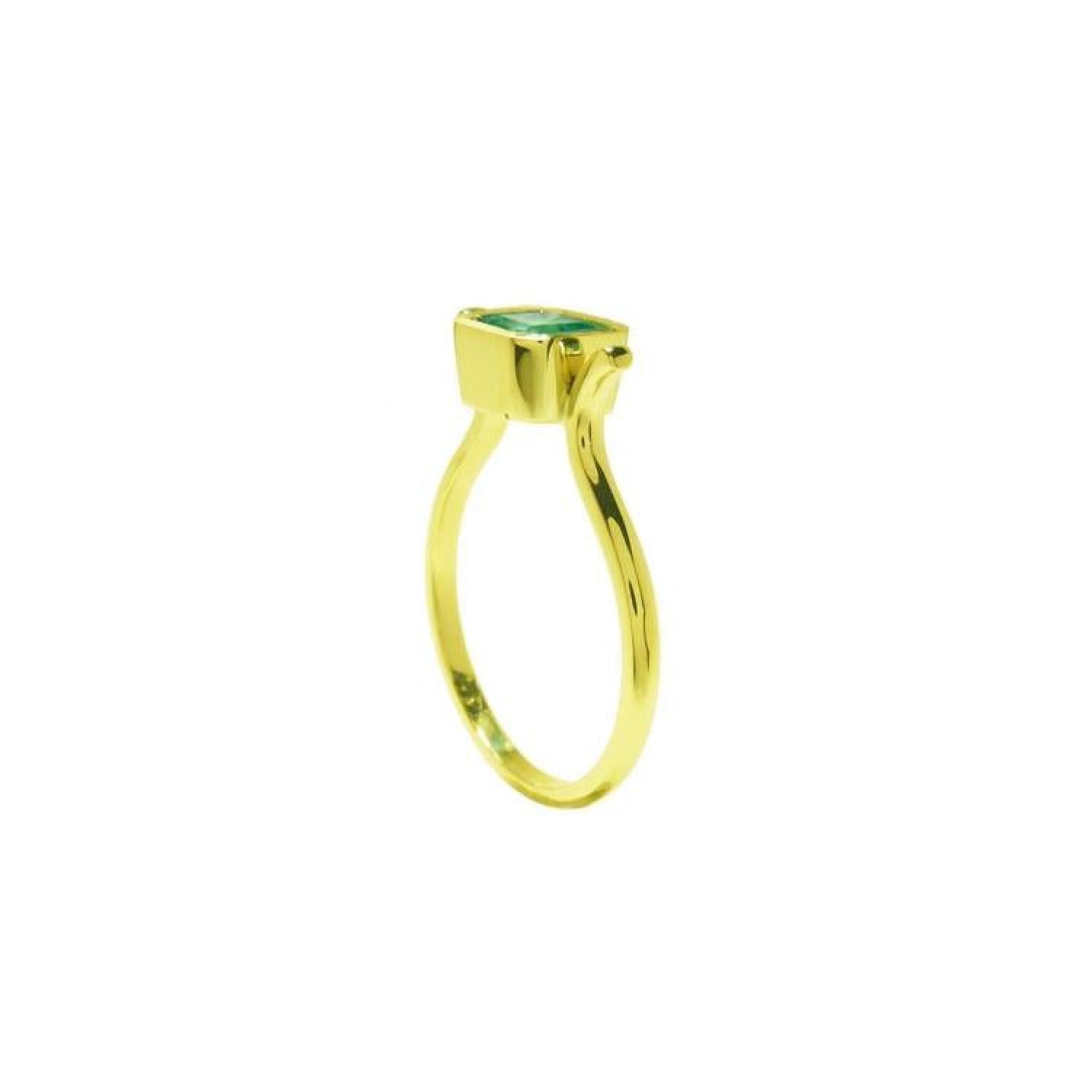 0.81 ct. emerald solitaire ring, bezel set in 14K yellow gold with a medium bluish-green emerald.