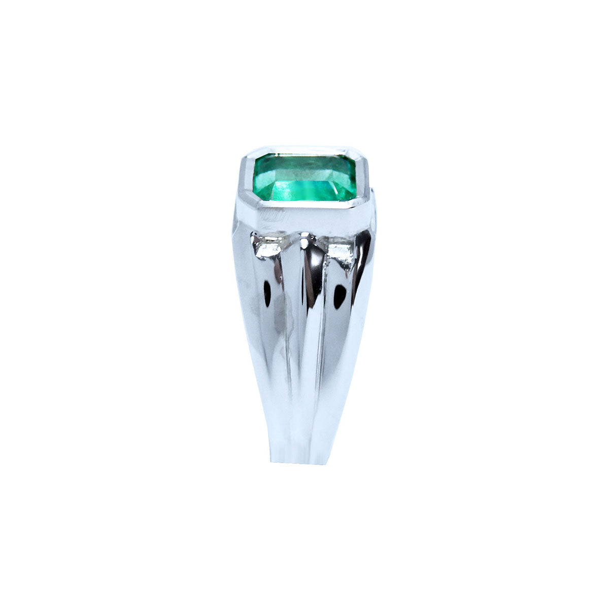 The top and side profile view of this white gold emerald ring for man.