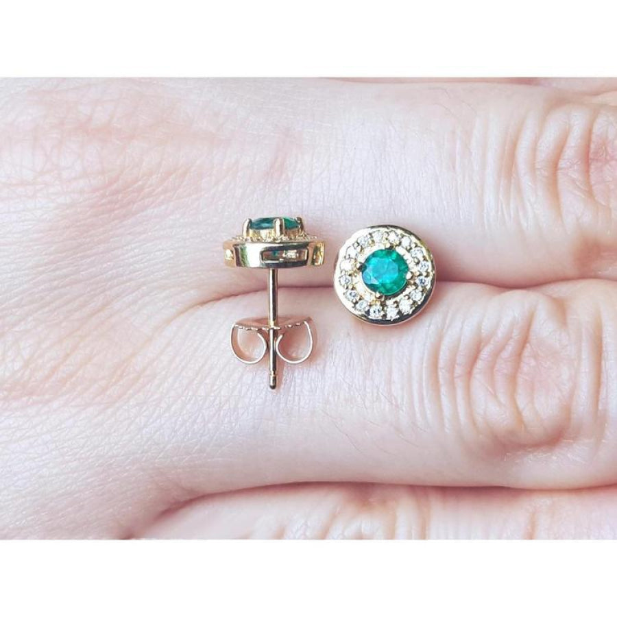 14k yellow gold emerald halo diamond stud earrings, round deep bluish-green emeralds.