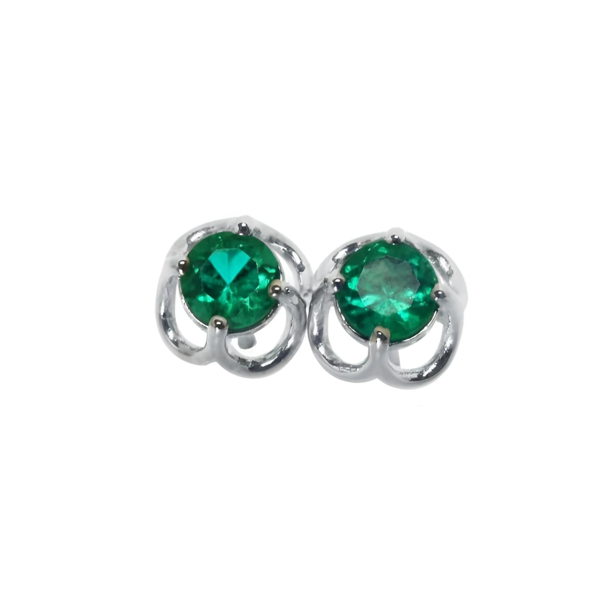 Pair of emerald tulip natural emerald stud earrings made of 14k white gold.