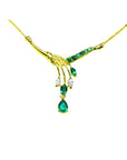 14K yellow gold necklace with marquise and pear-shaped Colombian emeralds and diamonds.