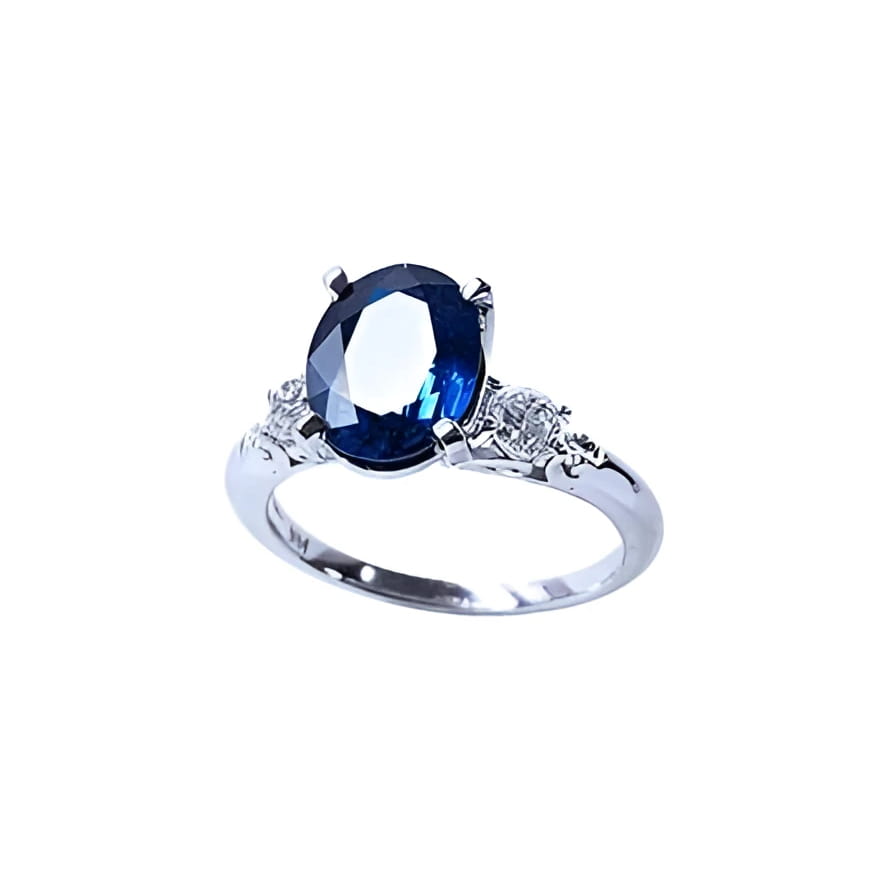 An oval cut natural sapphire engagement ring crafted in 14k white gold. September birthstone.