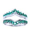 This enhancer emerald ring displays the topside detailed two rows of natural emeralds round cut.