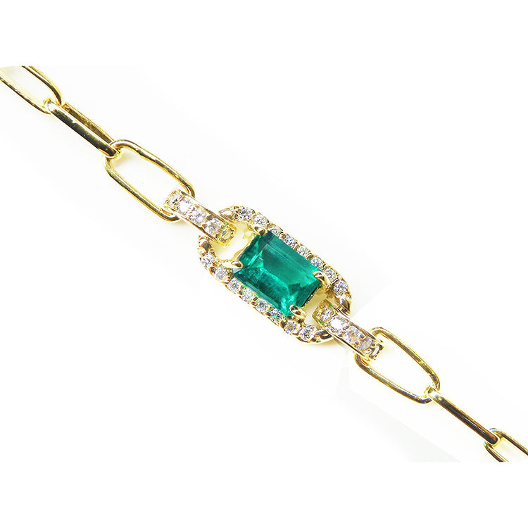 Brazalete para dama en oro con esmeralda colombiana y diamantes naturales.