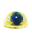 Gold ring with a central black opal stone and smaller side diamonds on a top and sides view profile.