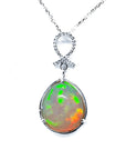 Ethiopian Welo opal pendant with multicolor shimmer, diamond bail, and 14K white gold chain.