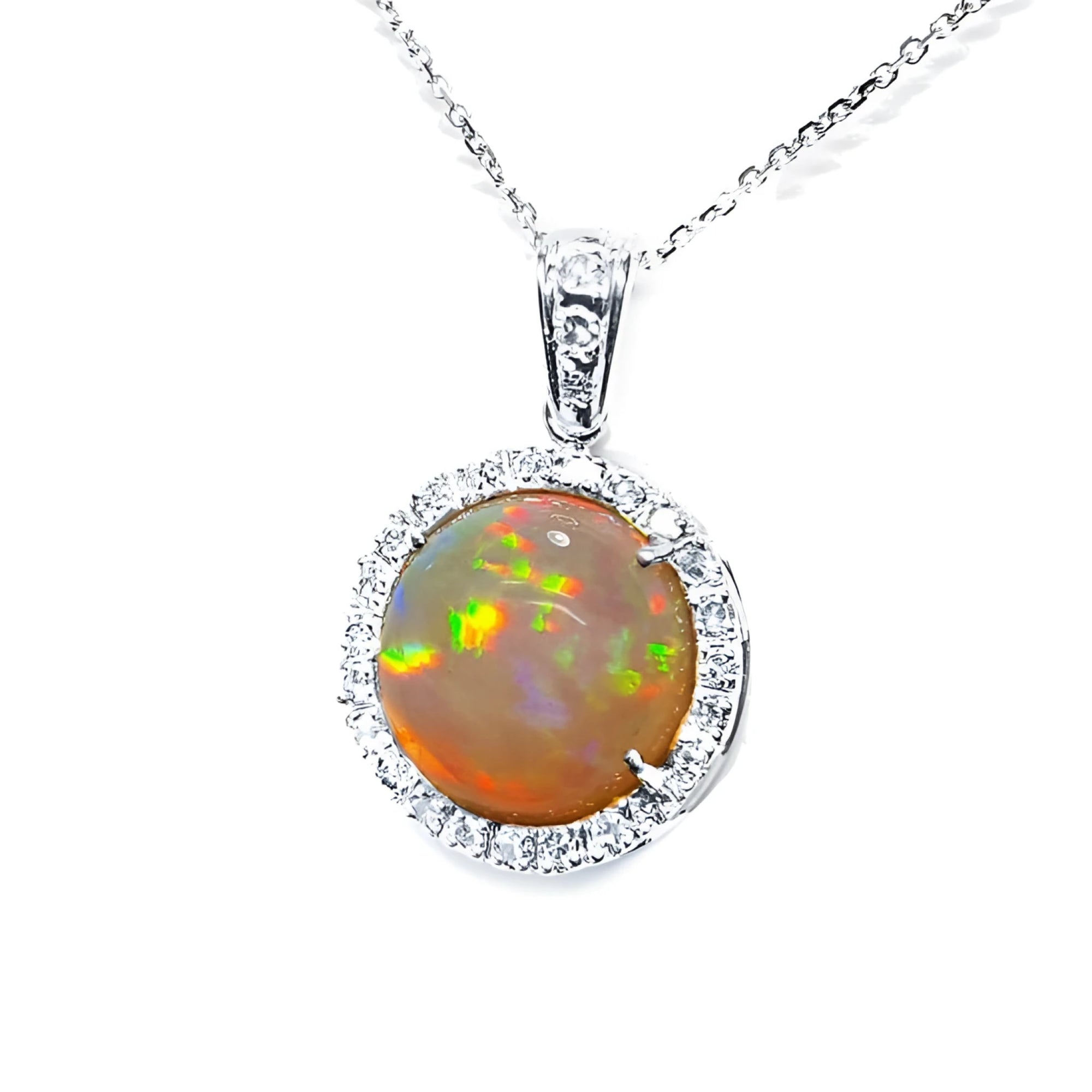 Ethiopian Welo opal pendant with red flashes, diamond halo, and 14K white gold chain.