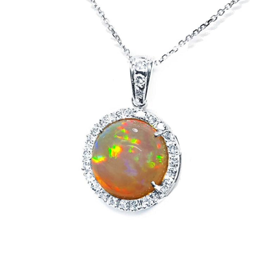 Ethiopian Welo opal pendant with red flashes, diamond halo, and 14K white gold chain.