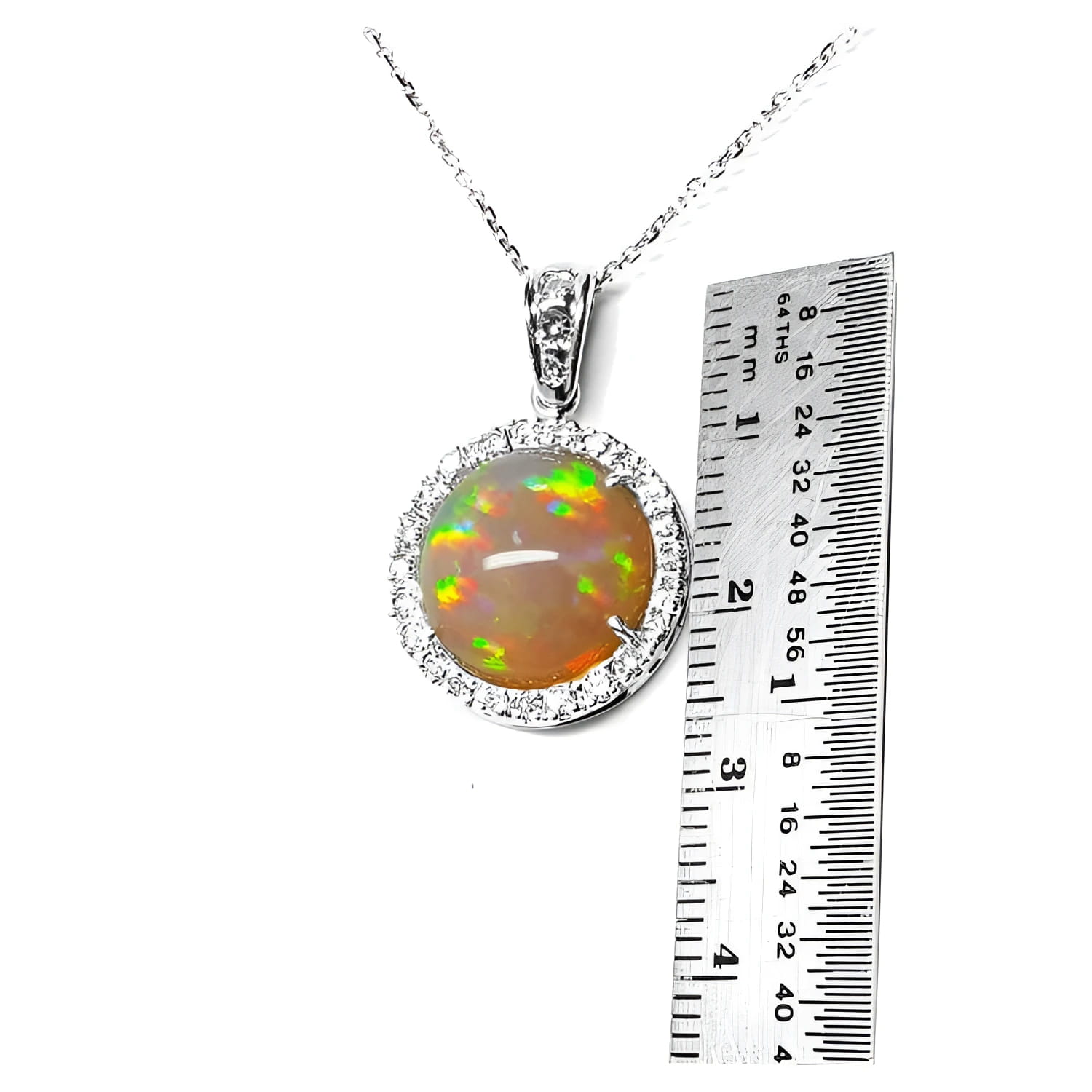 Ethiopian Welo opal pendant with red flashes, diamond halo, and 14K white gold chain.
