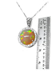 Ethiopian Welo opal pendant with red flashes, diamond halo, and 14K white gold chain.