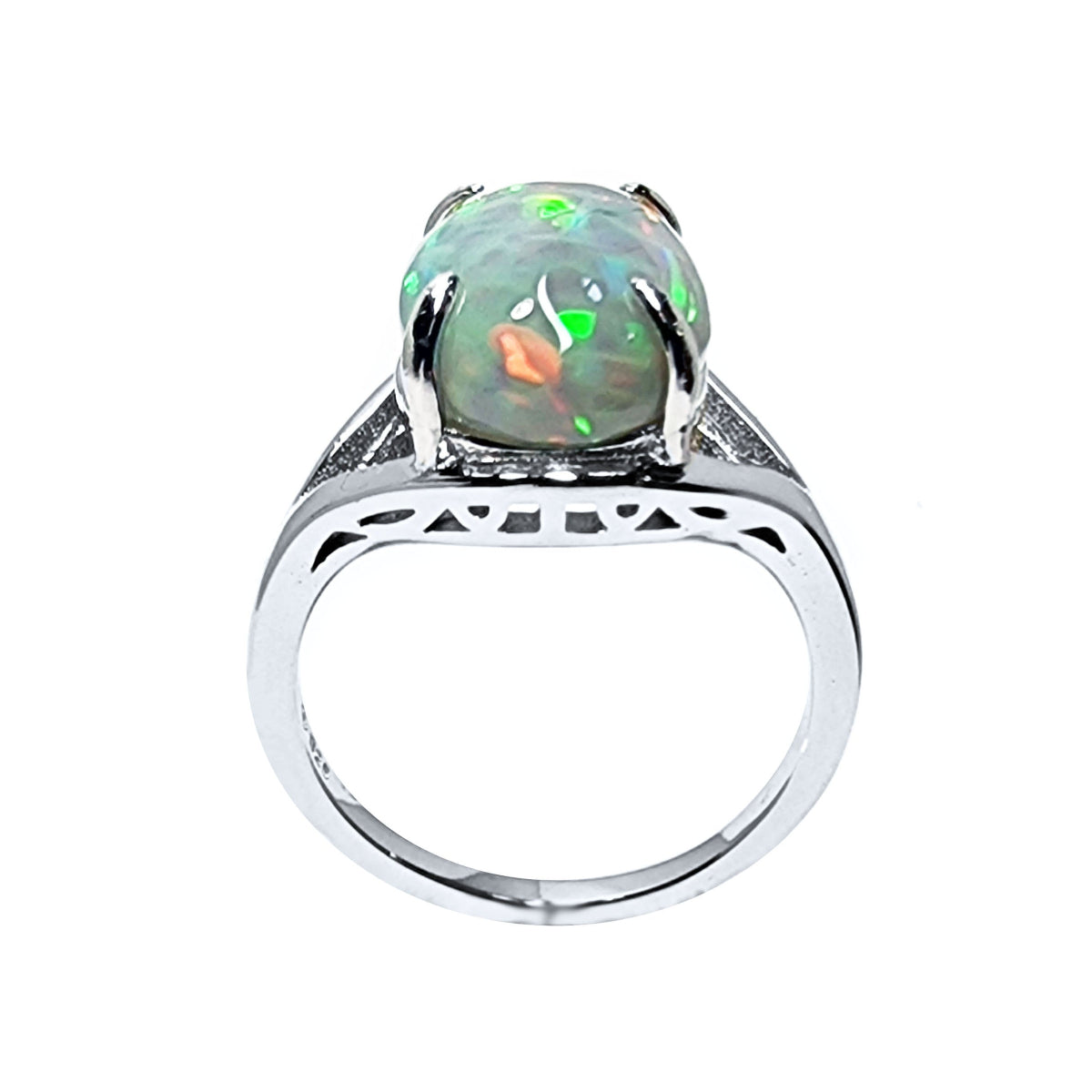Silver ring with a multicolor opal stone on a white background