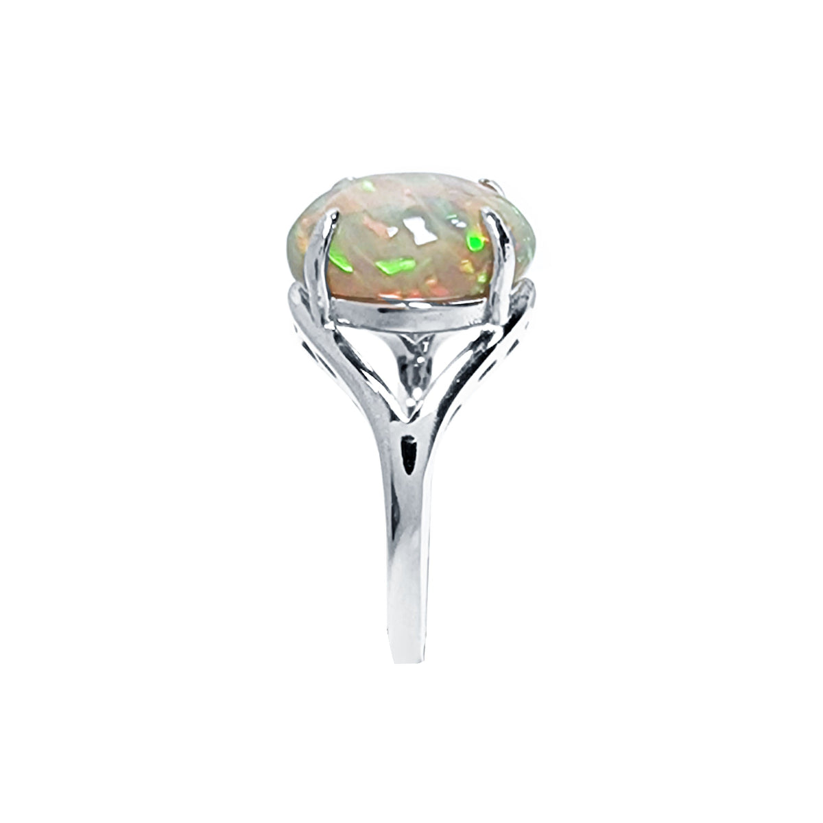 Silver ring with a central opal stone on a white background