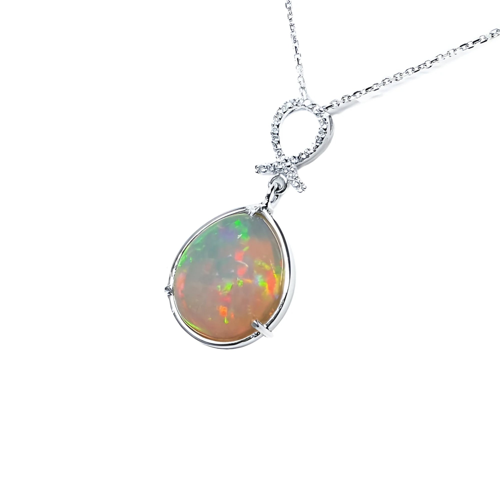 7.76 ct. Ethiopian Welo opal and diamond pendant in 14K white gold.