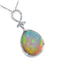 7.76 ct. Ethiopian Welo Opal and Diamond Pendant in 14K White Gold, featuring a pear-shaped opal with multicolor shimmer.
