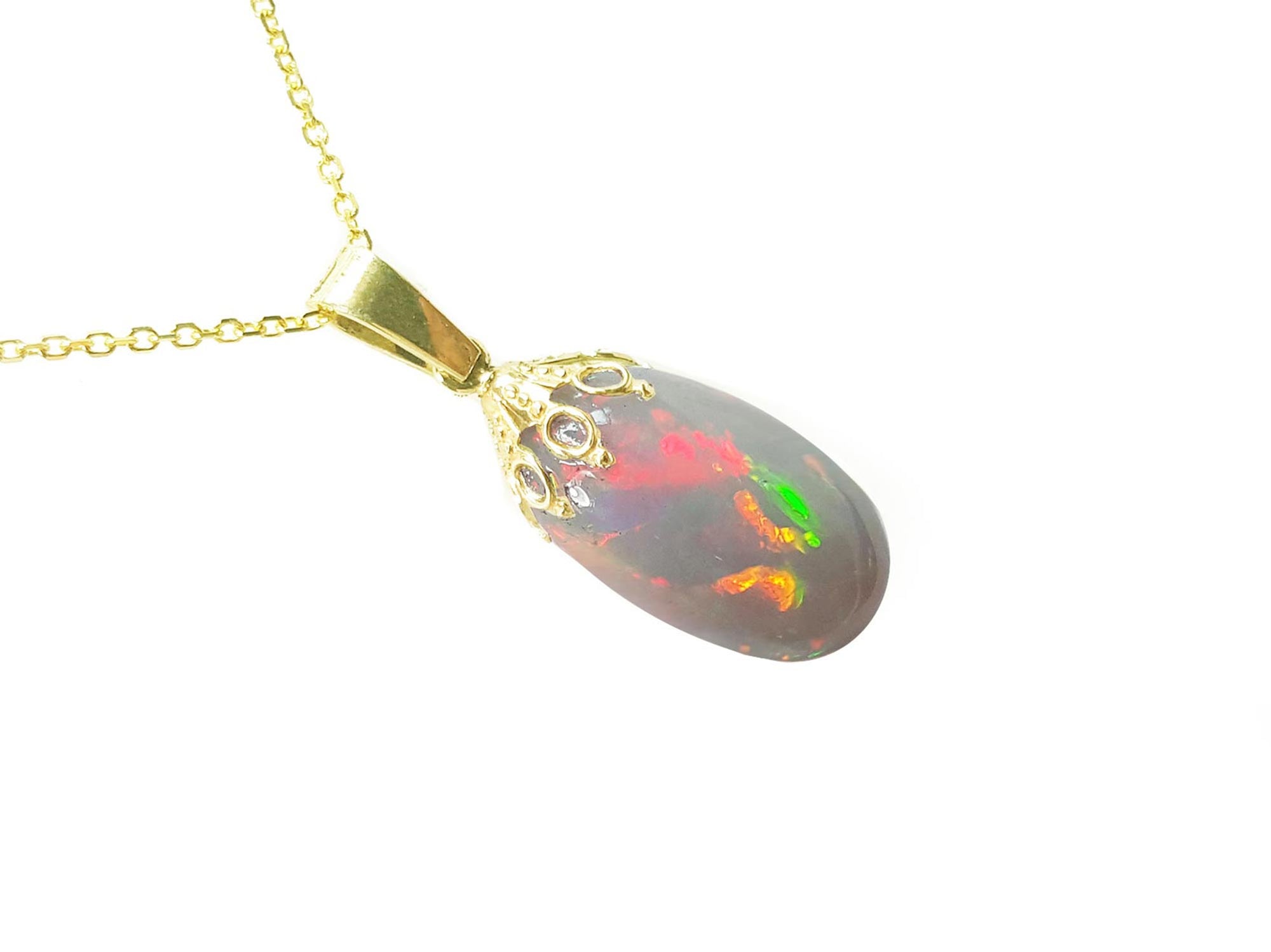 A yellow gold necklace with multicolor Welo Ethiopian opal pendant 