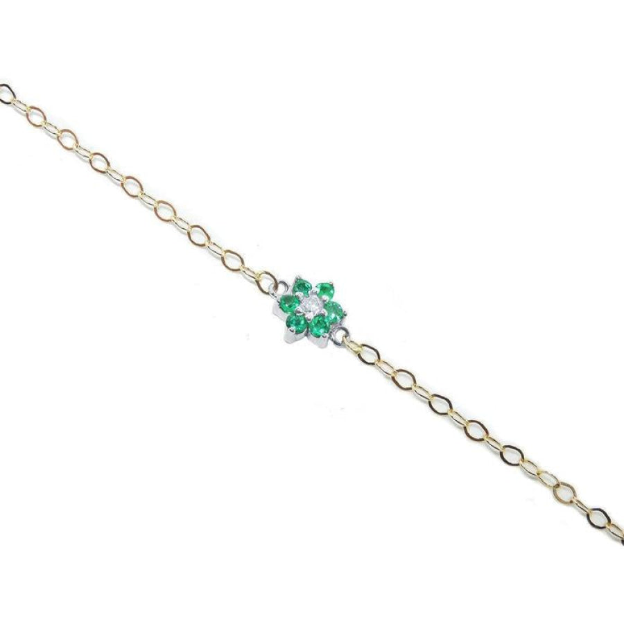 14K yellow gold chain bracelet with a central emerald and diamond flower cluster.