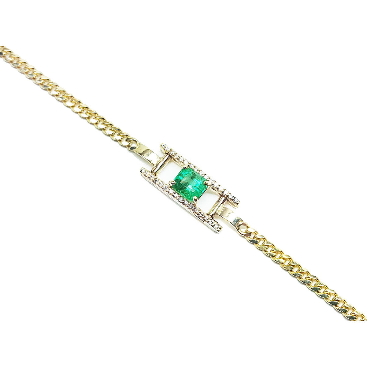 Gold bracelet with a centered colombian emerald on a topside far view.