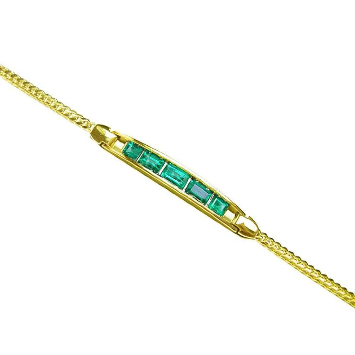 14K yellow gold bracelet with five emerald-cut Colombian emeralds.