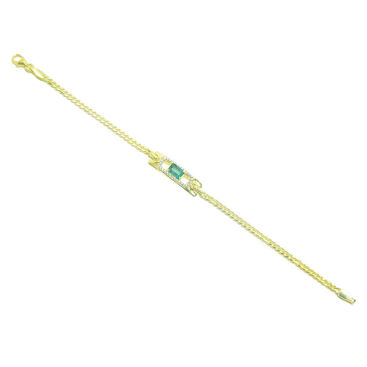 Gold bracelet with a Muzo colombian emerald on a distant view.