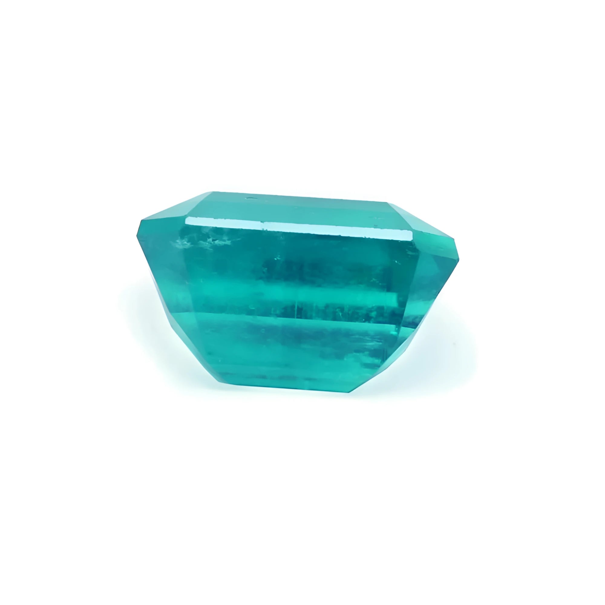 Untreated loose emerald from Muzo mines with a vibrant bluish medium-deep green hue.