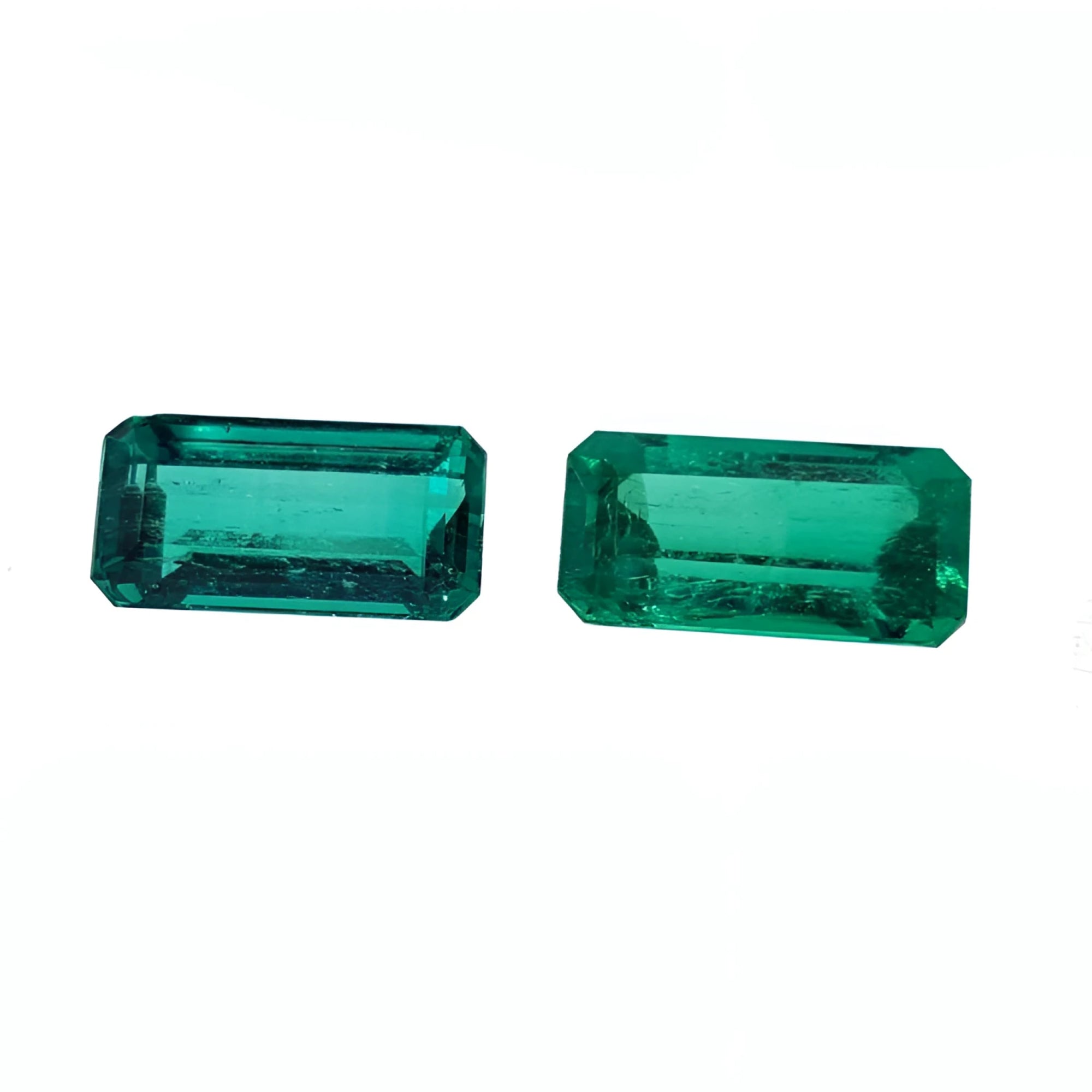 Loose natural colombian emeralds matching pair set fine quality, Two Sparkling, Natural Emeralds in a Striking Hue.