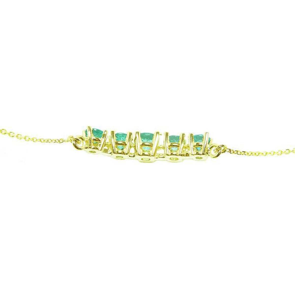 Sparkling 14K gold necklace with five round-cut medium light green Colombian emeralds.