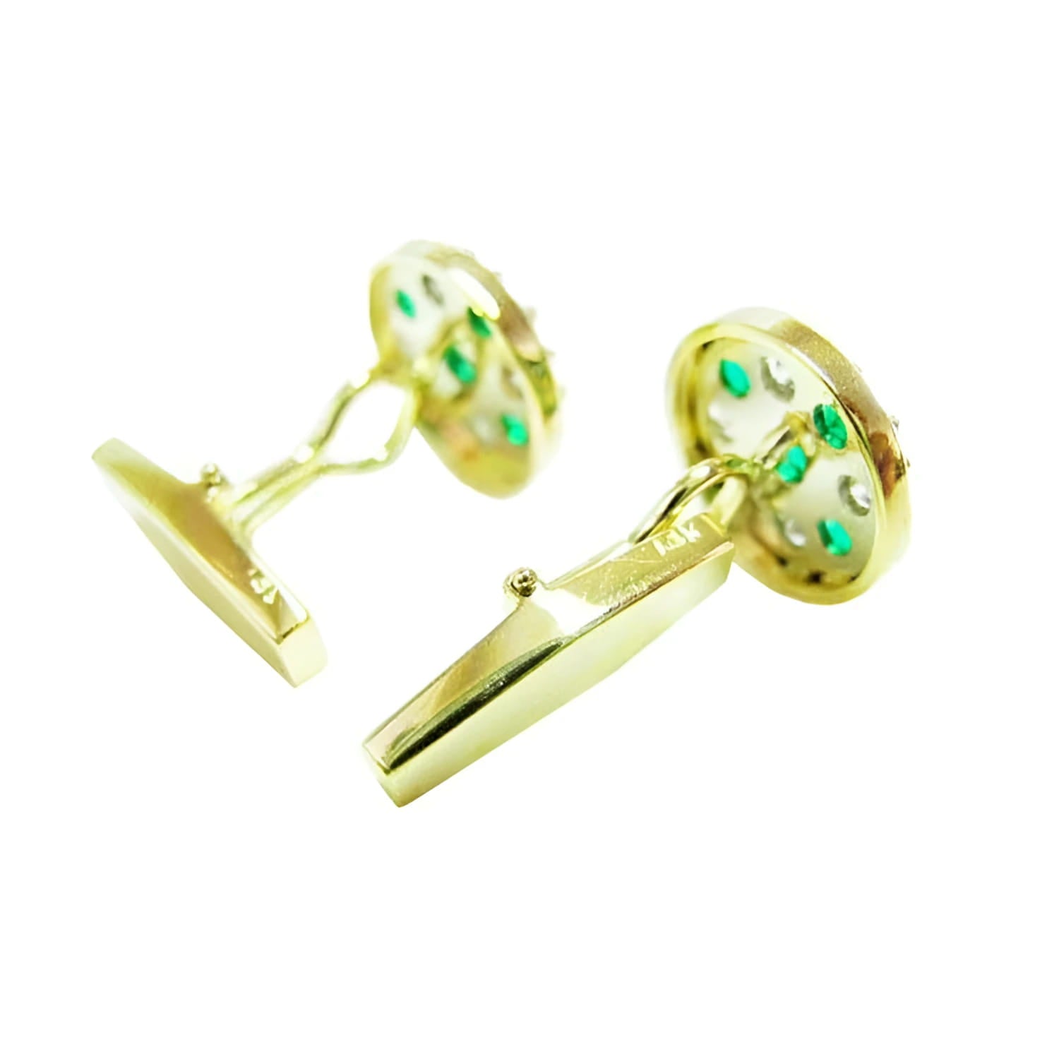 Men's gold cufflinks with natural emeralds and diamonds in a round setting.