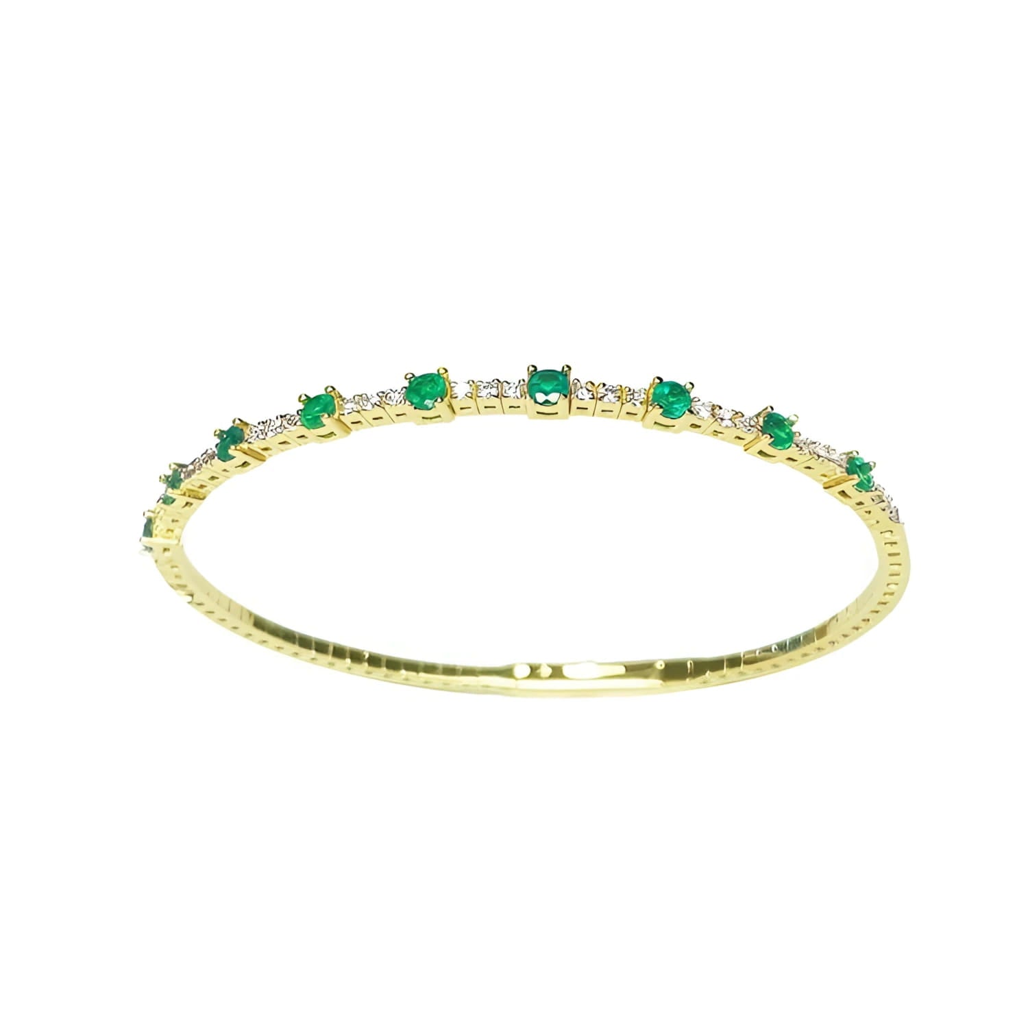 Flexible 14K yellow gold bangle with oval emeralds and accent diamonds.