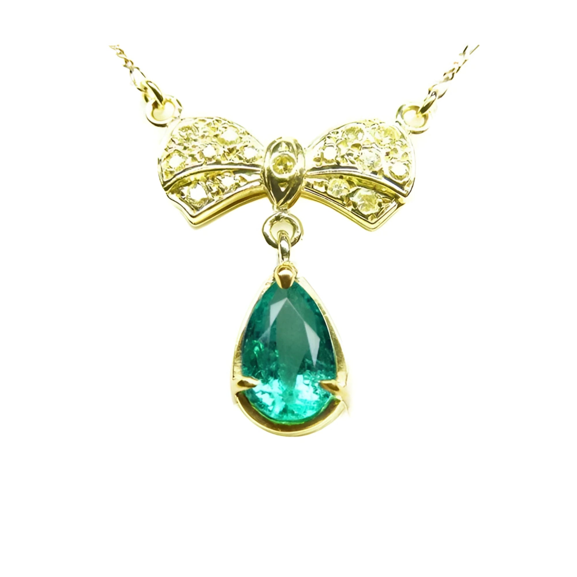 Pear shaped natural emerald bowtie necklace from Muzo mine in Colombia, yellow diamonds pave set in 18k yellow gold