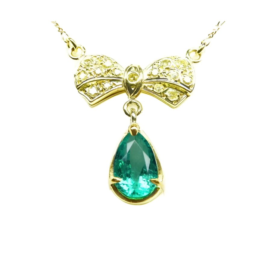 Pear shaped natural emerald bowtie necklace from Muzo mine in Colombia, yellow diamonds pave set in 18k yellow gold