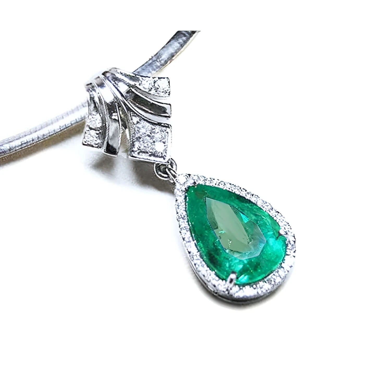Enhancer emerald necklace pear cut emerald medium green hue encircle by a halo of natural diamonds 18k gold