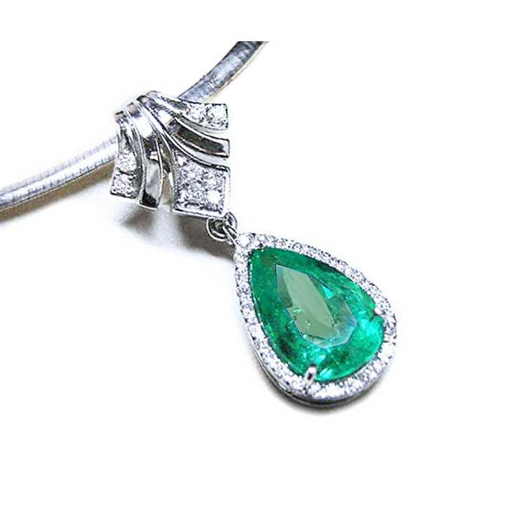 Enhancer emerald necklace pear cut emerald medium green hue encircle by a halo of natural diamonds 18k gold