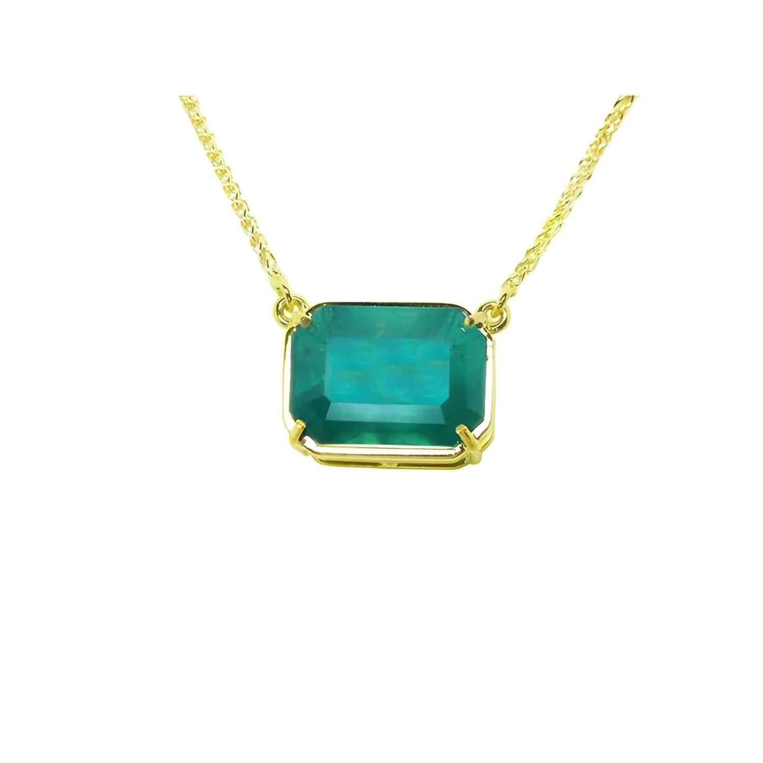 Colombian emerald solitaire necklace sourced from the Muzo mine, set in a handcrafted 18k yellow gold frame