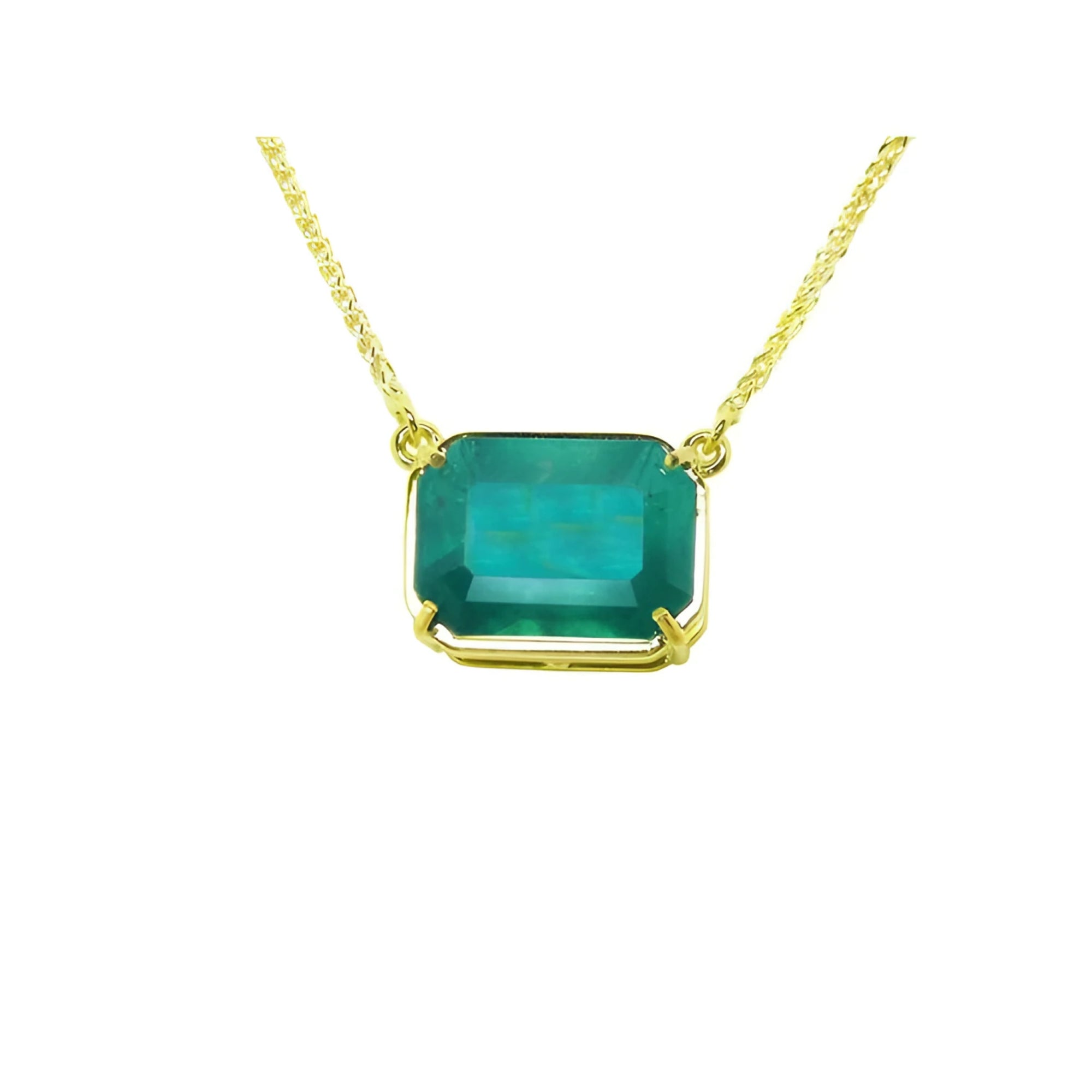 Colombian emerald solitaire necklace sourced from the Muzo mine, set in a handcrafted 18k yellow gold frame