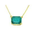 Colombian emerald solitaire necklace sourced from the Muzo mine, set in a handcrafted 18k yellow gold frame