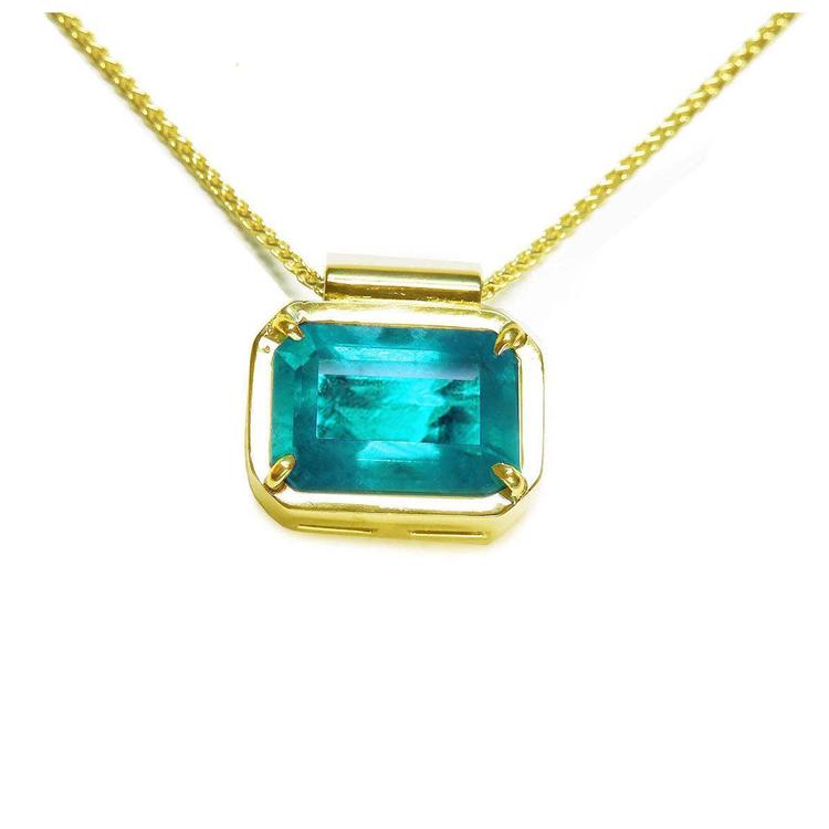Emerald jewelry necklace solitaire east west orientation emerald-cut rectangular natural