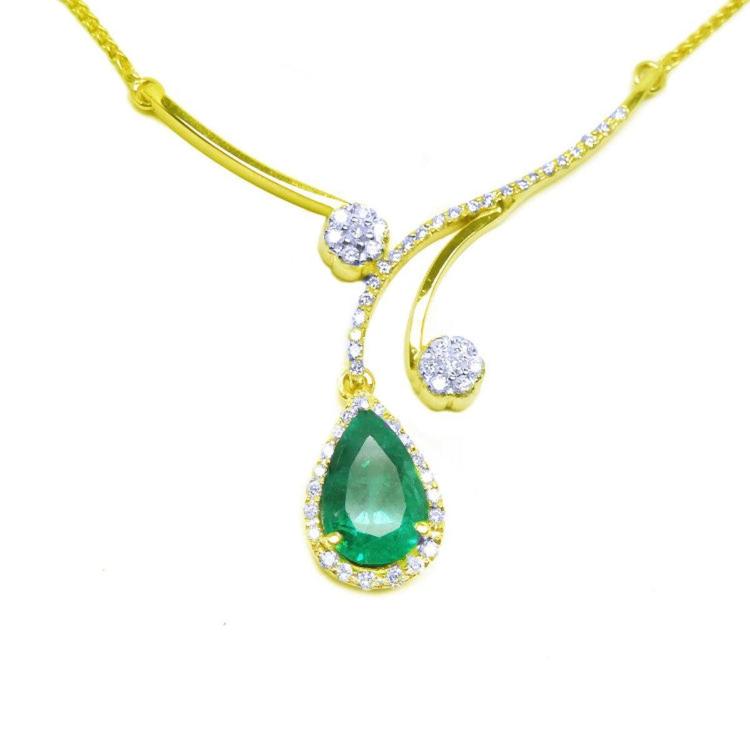 Colombian emerald gold necklace deep green hue teardrop pendant halo diamond.