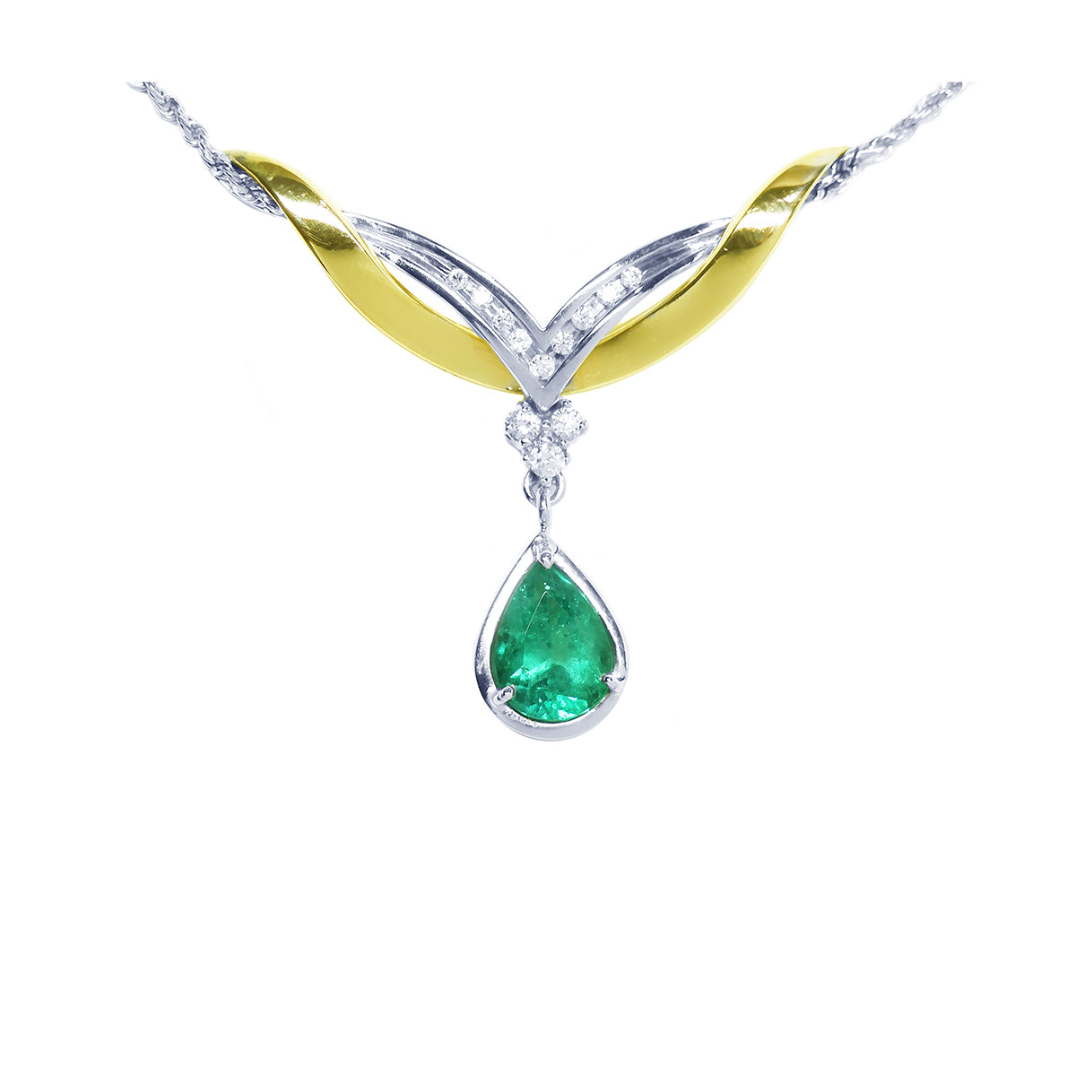 A front view of a solitaire emerald dangling necklace crafted in 14k white and yellow gold on a white background