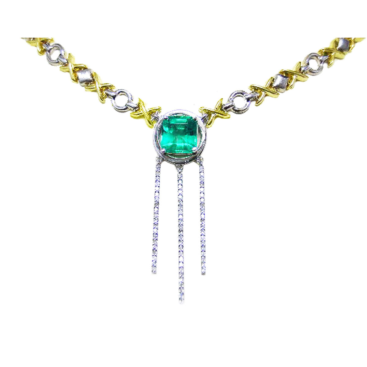 Front view of an necklace with a square natural emerald gemstone and gold and silver chain on a white background
