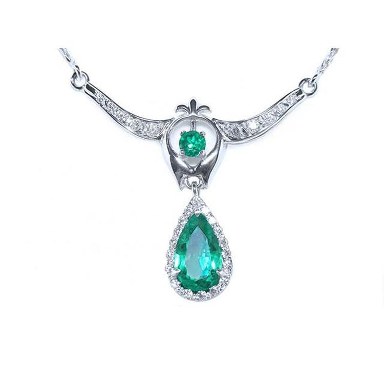 Emerald jewelry necklace pear-shaped Muzo mine accented by natural diamonds.