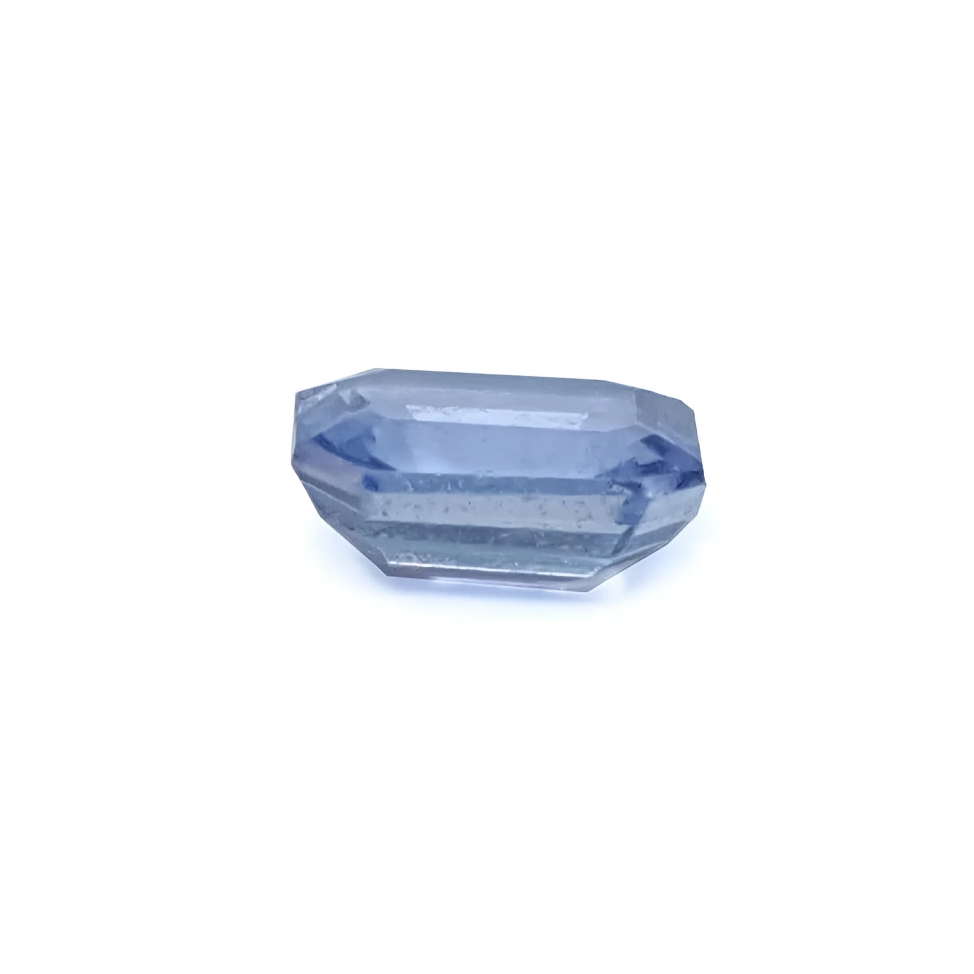 1.24 ct genuine loose medium light blue emerald-cut sapphire.