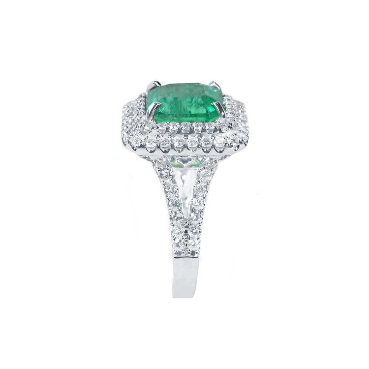 4.14 ct GIA-certified F1 Colombian emerald ring with diamond halo and split shank in 14K white gold.