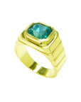 A 18k yellow gold men's ring with a GIA certified F1 natural colombian emerald bezel set.
