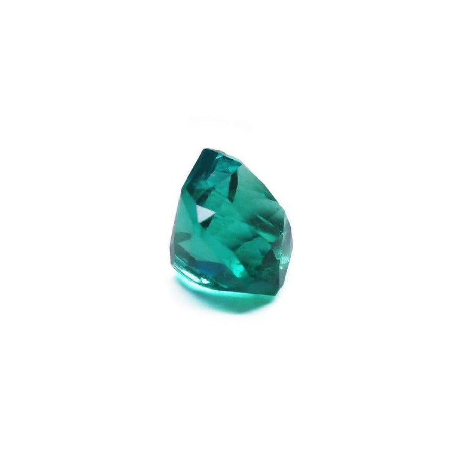 2.45 ct GIA certified Asscher cut emerald with vibrant bluish-green color.