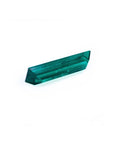 3.13 carat baguette cut Colombian emerald, eye-clean, sparkling bluish-green.