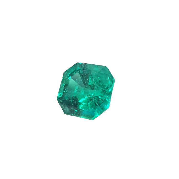 GIA certified emerald-cut loose Muzo Colombian emerald left side view