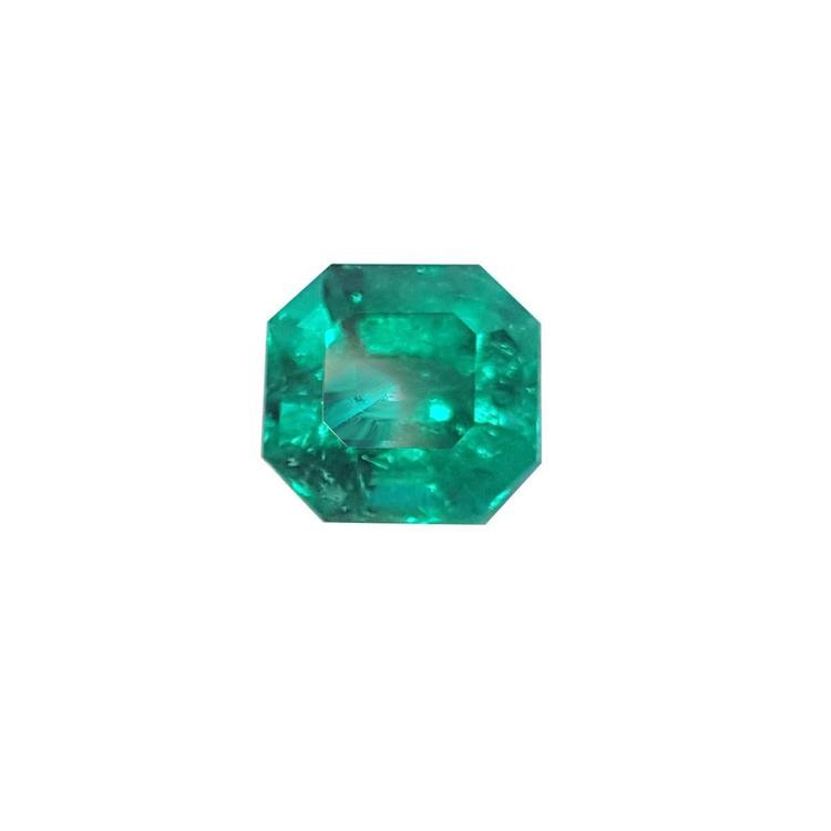 GIA certified natural emerald-cut loose Muzo Colombian emerald sparkling bluish medium-deep green color.