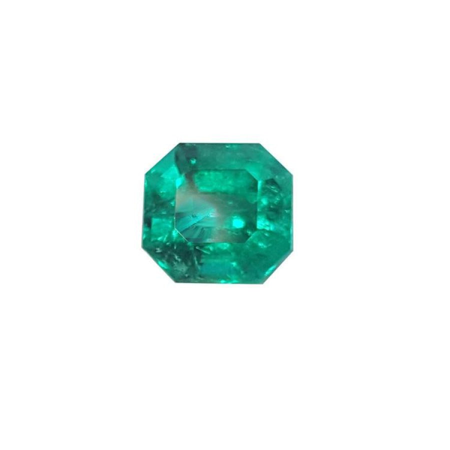 GIA certified natural emerald-cut loose Muzo Colombian emerald sparkling bluish medium-deep green color.