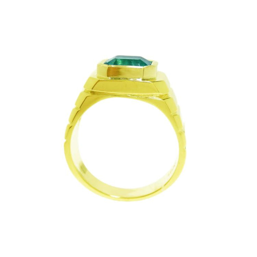 Men's 18K yellow gold ring with a medium-deep green emerald in a full bezel setting, masculine design.